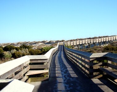 Wooden beach shadows photo