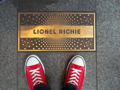 Singer lionel richie gray shoes photo