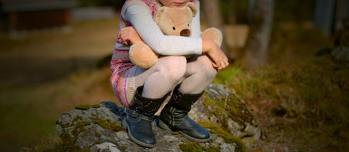 Girl nature teddy bear photo