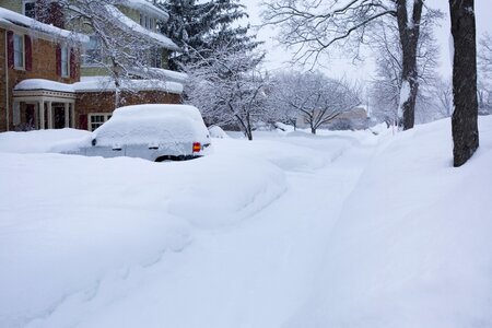 Car snowy street covered photo