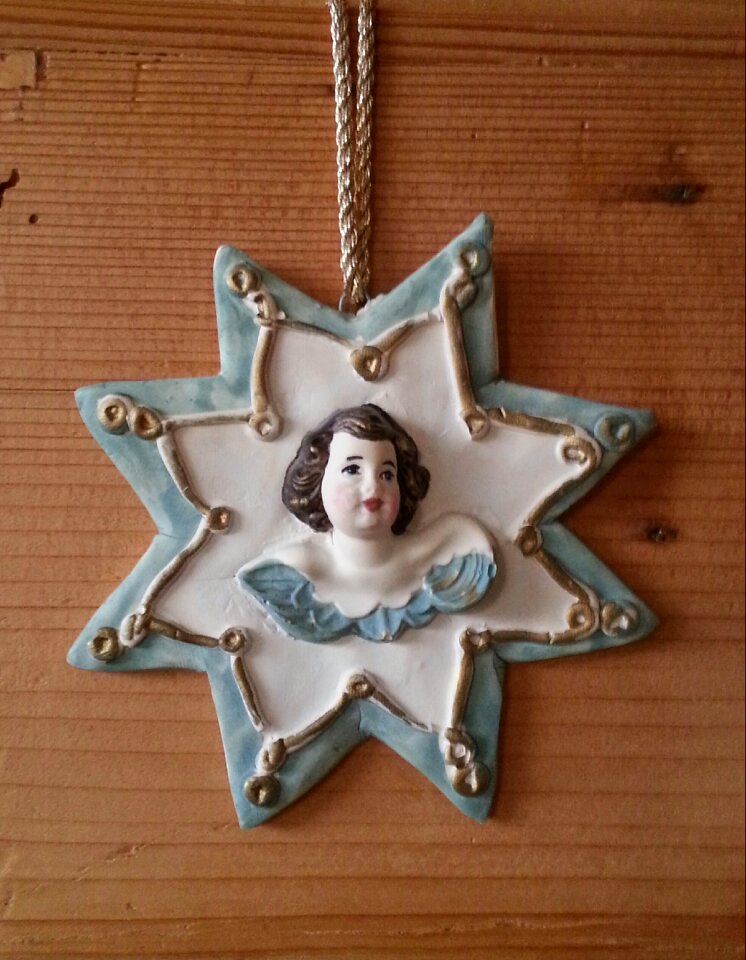 Poinsettia angel christmas decoration