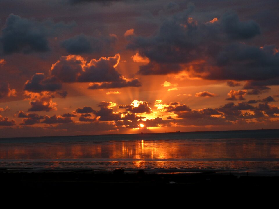 Sunbeam fireball setting sun