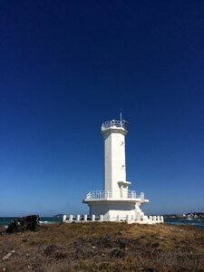 Jeju island lighthouse sky