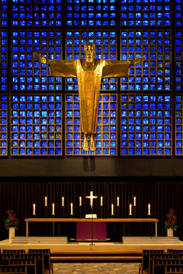 Altar gold cruciform christ vibrant stained glass