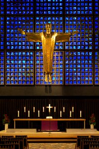 Altar gold cruciform christ vibrant stained glass photo