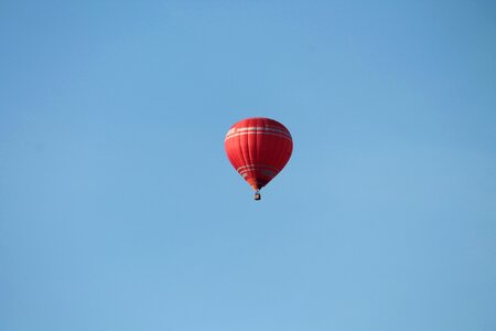 Red partly cloudy blue
