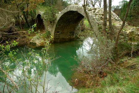 Roman bridge ruin creek photo