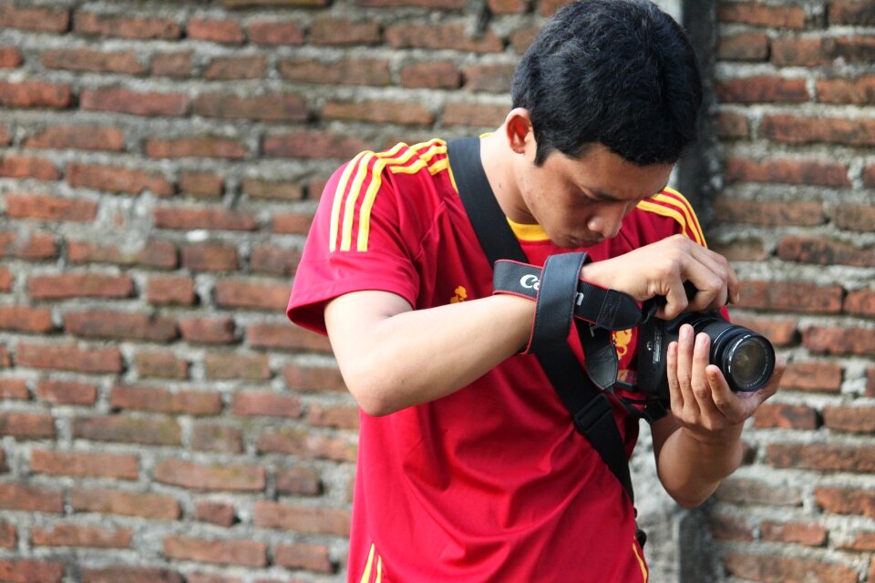 Man camera photographing