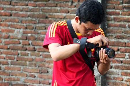 Man camera photographing