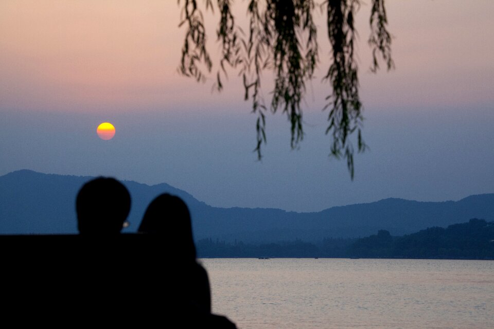 Sunset couple horizon