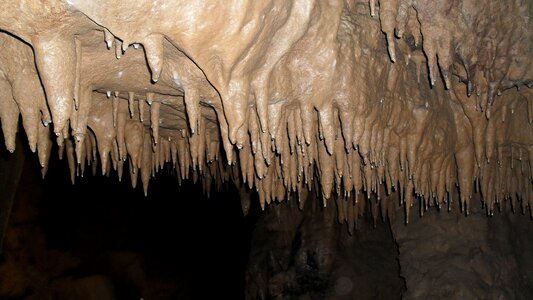Limestone underground stalagmite photo