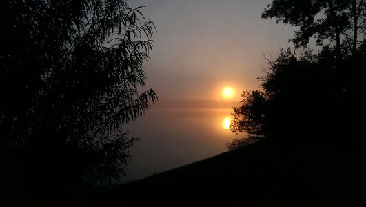Sun mist dawn photo