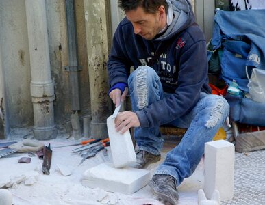 Artisan stonecutter sculpture