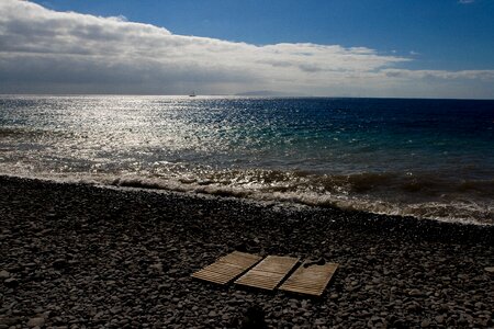 Stone beach island cloudy photo