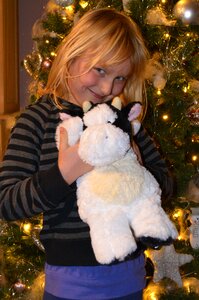 Girl stuffed animal happy