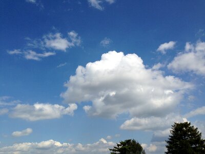 Clouded sky cumulus clouds blue sky photo