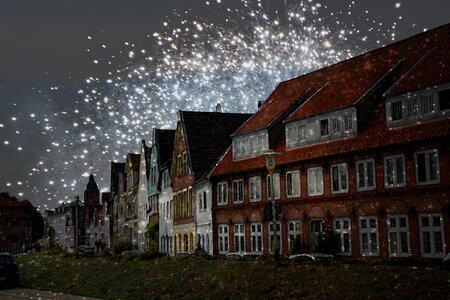 Happiness city fireworks row of houses photo