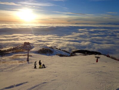 Fog ski slope sunset photo