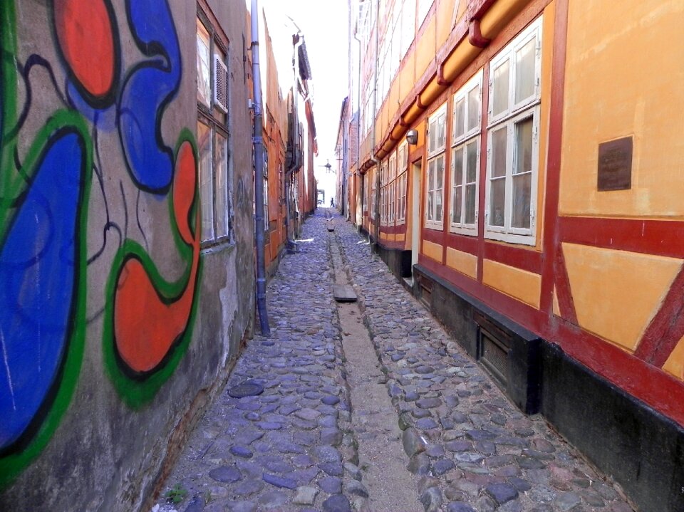 Narrow street graffiti window