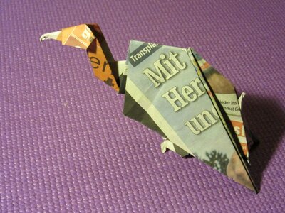 Bird fold newspaper