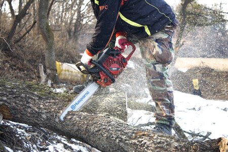 Chainsaw axe sawdust