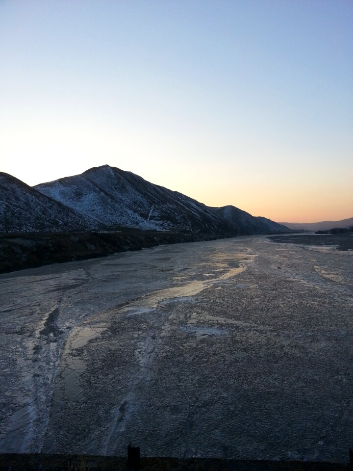 Frozen river in the cold winter