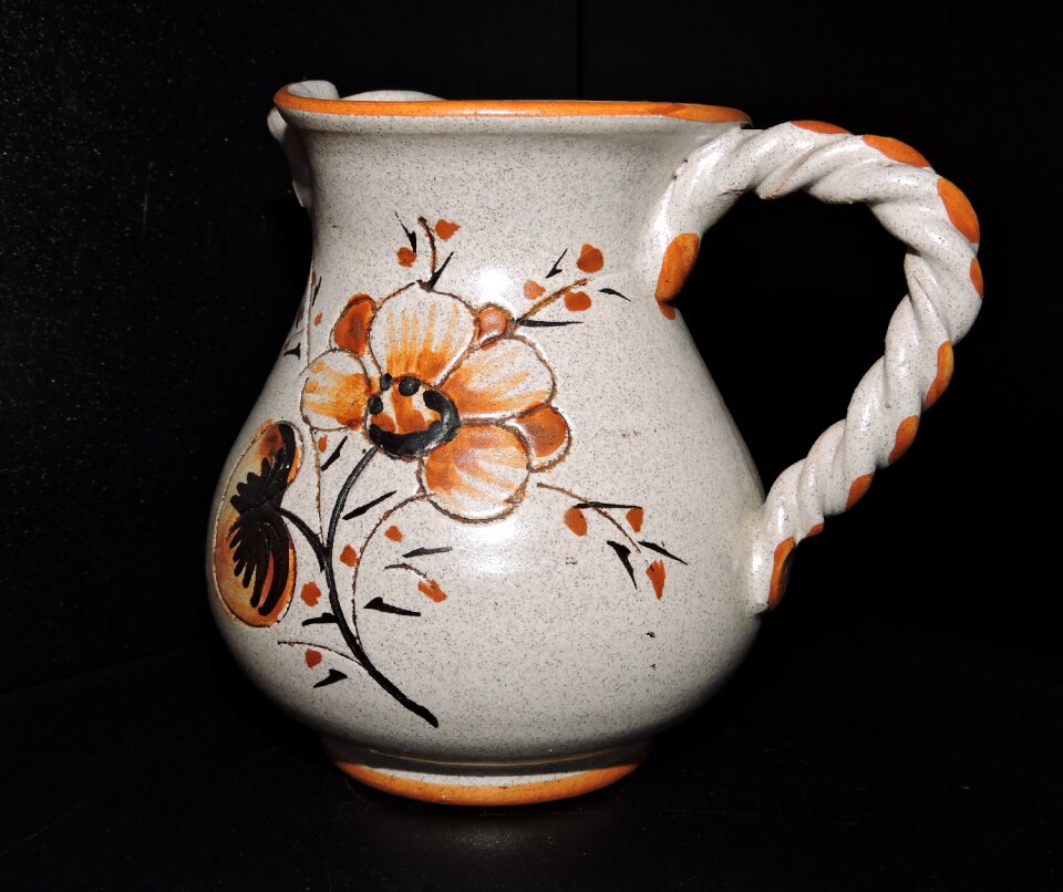 Terracotta flower black background