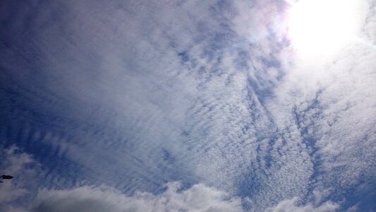 Blue sky clouds sol photo