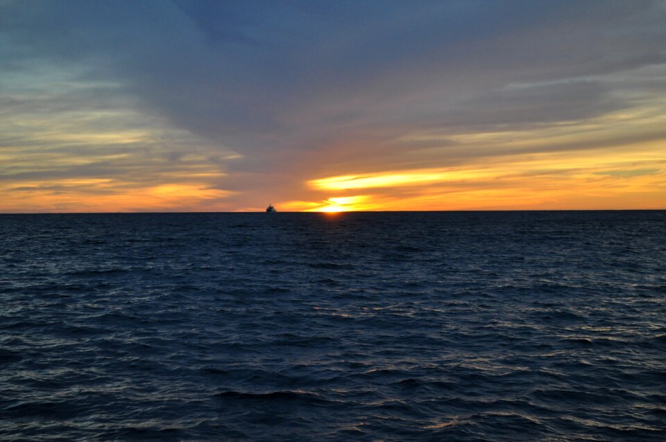 Sun sunset calm sea ocean