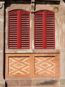Closed wooden shutters red photo