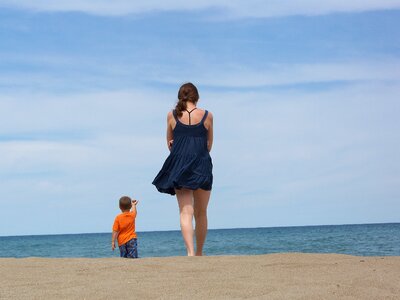 Boy walk water photo