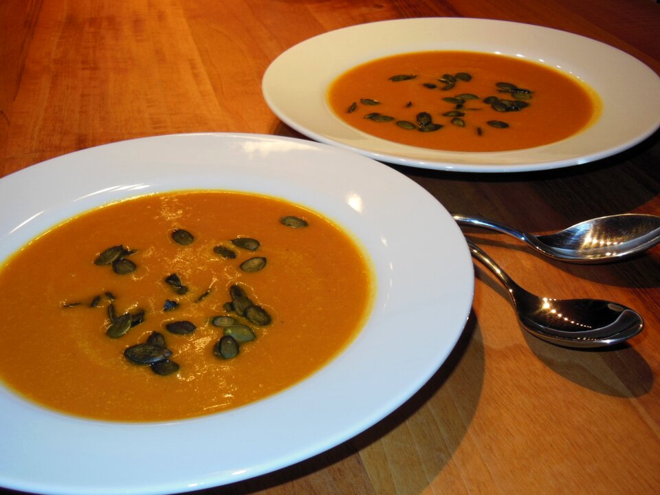 Spoon warm pumpkin soup