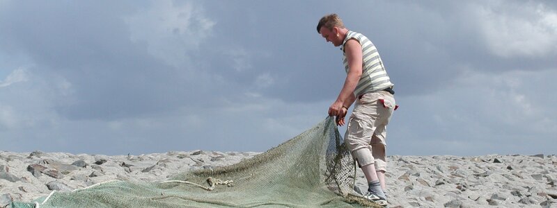 Fisherman fishing net port photo