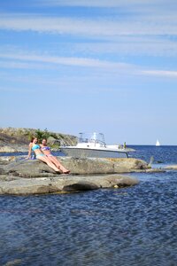 Motor boat archipelago sky blue photo