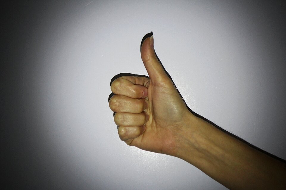 One thumb thumbs up