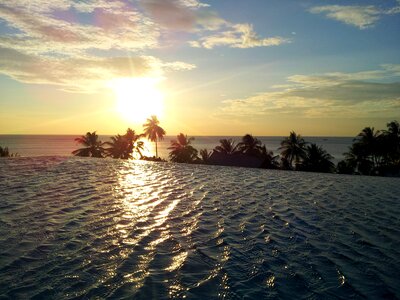 Rooftop pool clouds sky