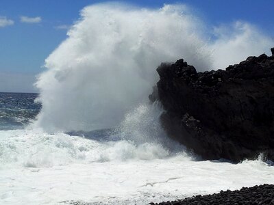 Sea foam breakwater photo