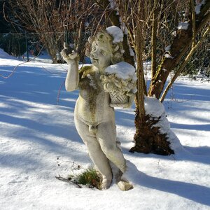 Stone snow stone figure photo