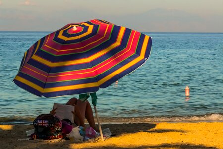 Vacation umbrella chair photo