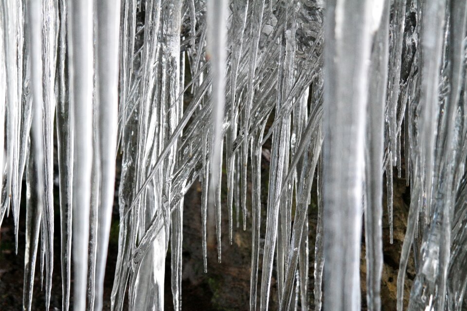 Snow frozen stalactites
