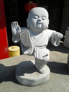 Carved stone doll play