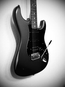Electric guitar black white stratocaster photo