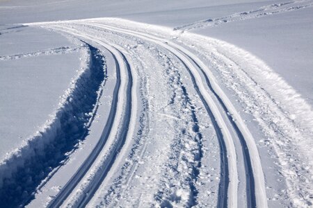 Ski track by machine snowy photo
