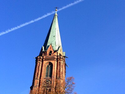 Contrail spire church photo