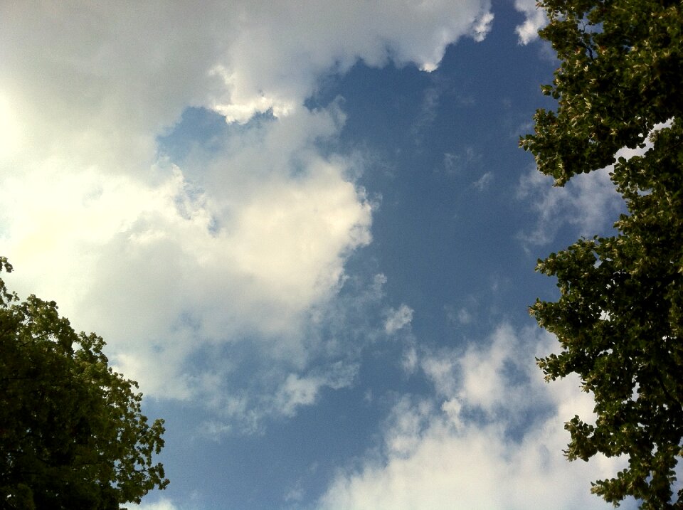 Clouds form white cumulus clouds
