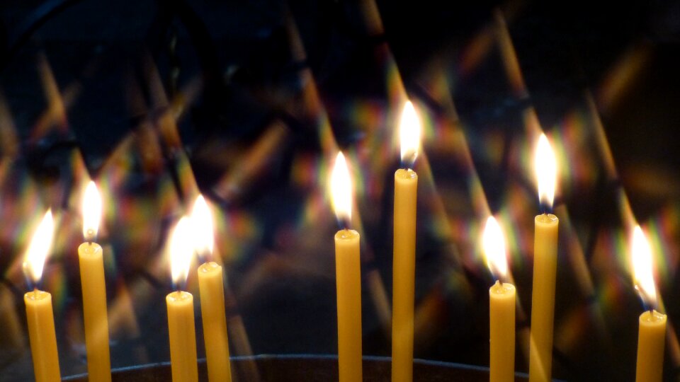 Warm church candle flame