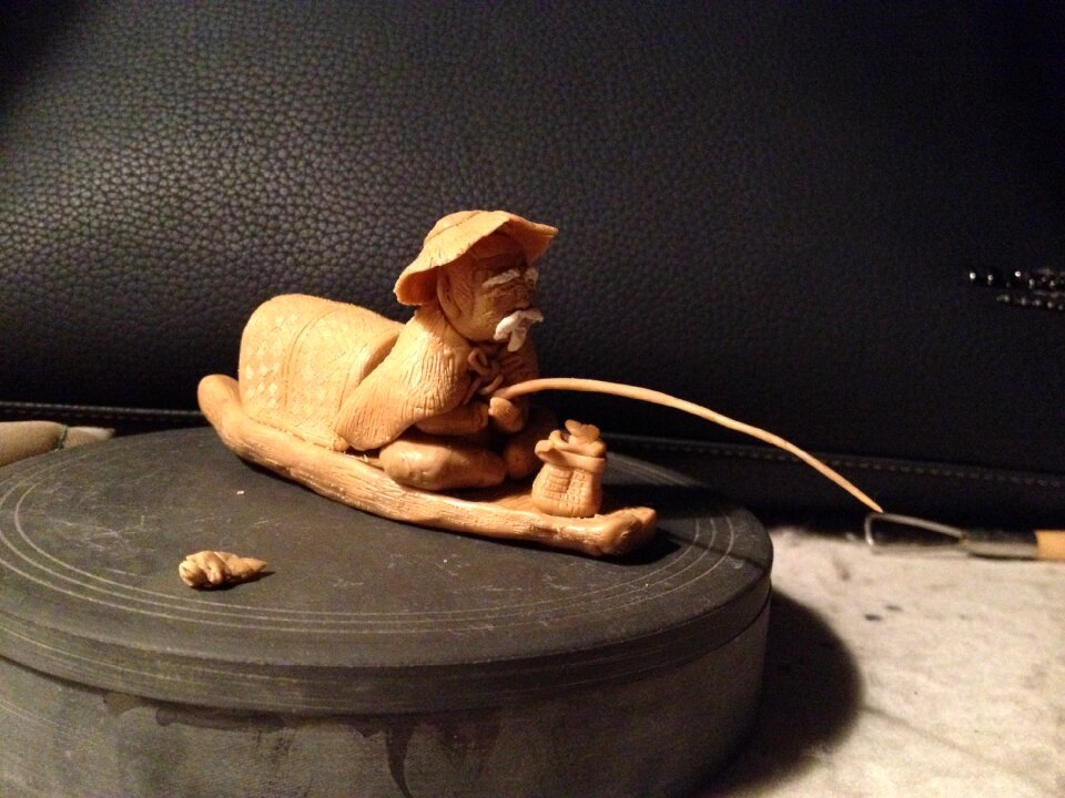 Clay sculpture fisher clay figurine