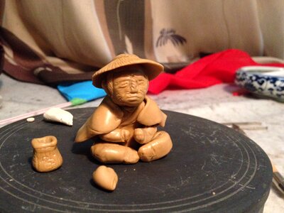 Clay sculpture fisher clay figurine
