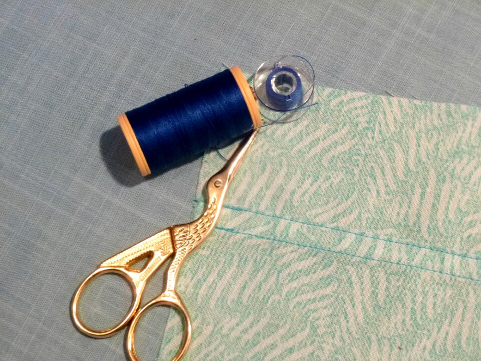 Fabric bobbin scissors photo