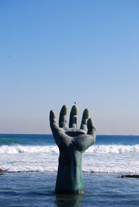 Sea hand sculpture photo
